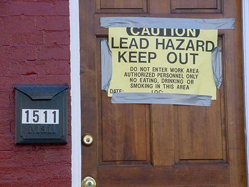 Sign warns of lead abatement