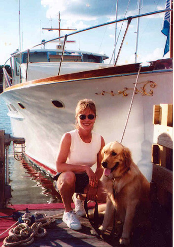 Nautical Destinations Partner Lynne Forsman and dog Trumpy.  