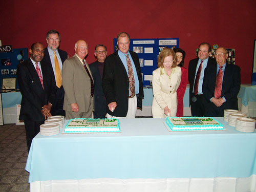 MDE 20th Anniversary Photo - Cake cutting