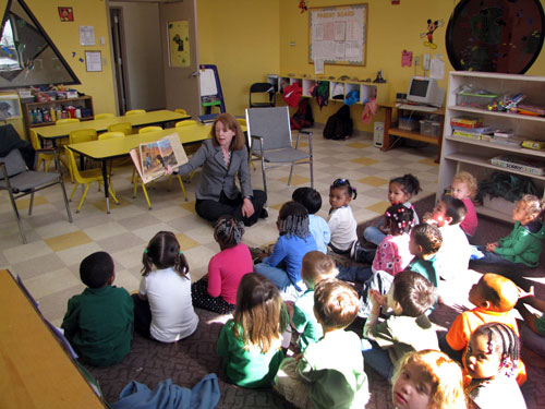 Secretary Wilson reading to elementary school kids