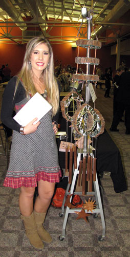 Lizelle Roose, of Century High School, won in the Workmanship category for chimes made from wood, copper piping, and mirrors