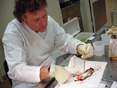 Lab worker investigating fish kills