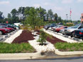Maryland Environmental Services (MES) parking lot treatments system using bio-retention filtering systems.