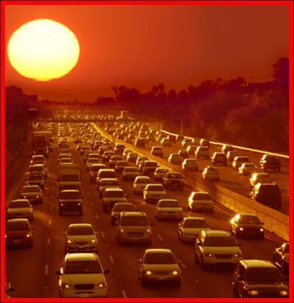 Cars stuck in traffic on a hot summer day