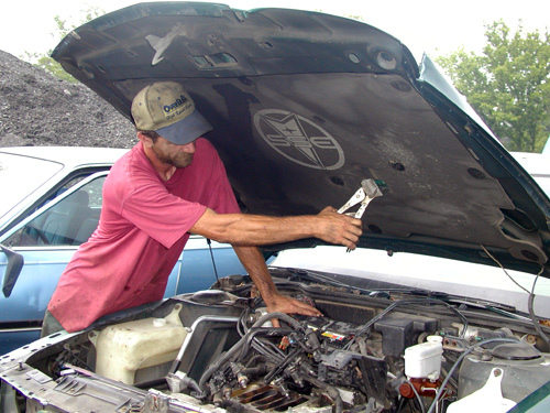 Photo of removing mercury switch from a vehicle