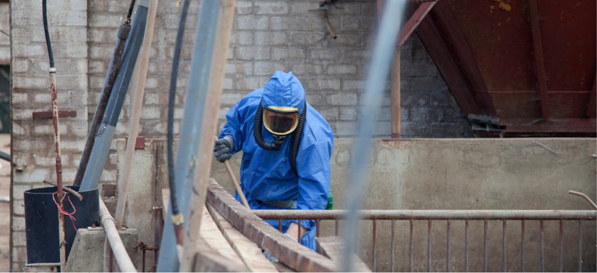 Asbestos Contractor Cleaning Up Image