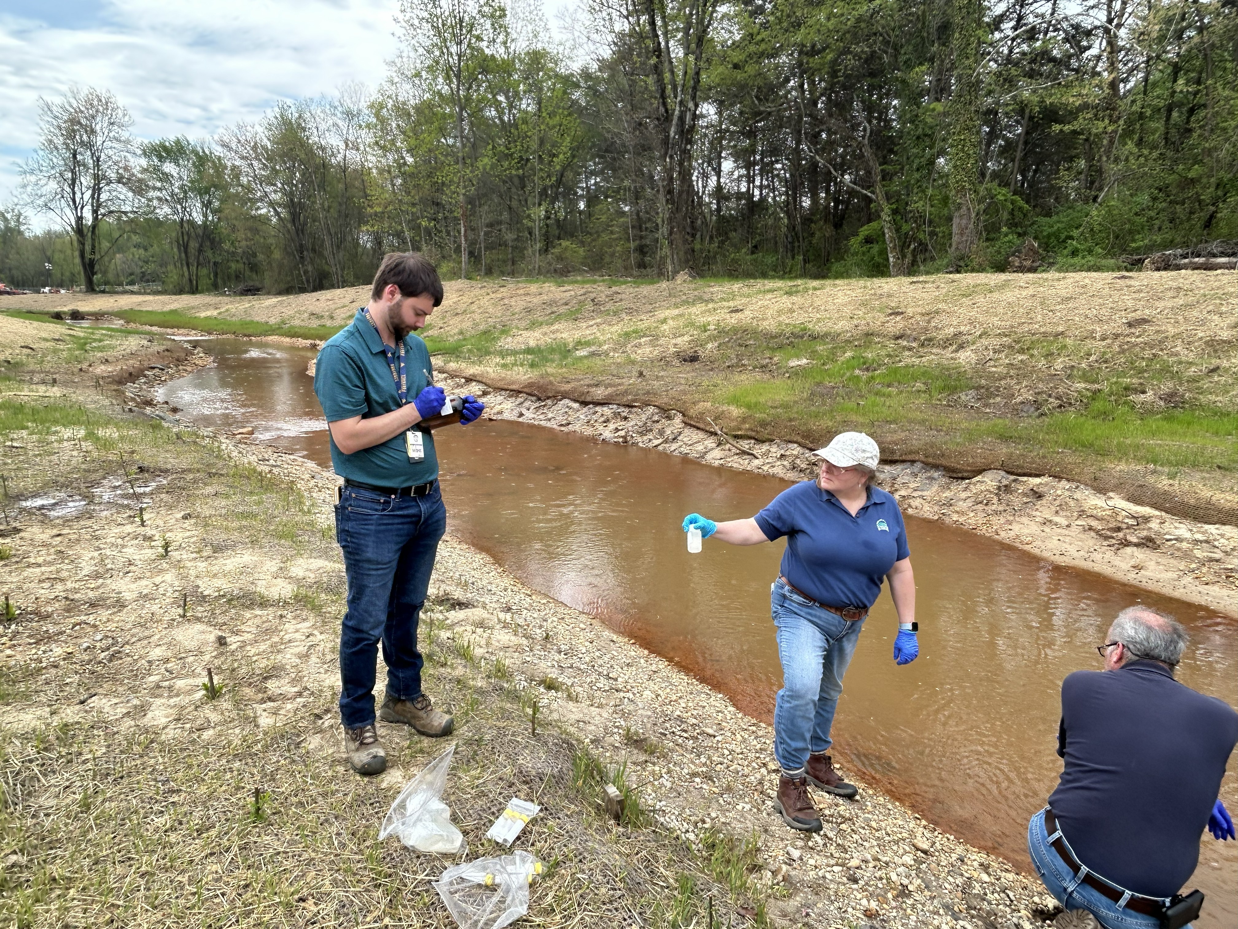 Group MDE employees overseeing the cleanup to restore any effects to Piscataway Creek 
