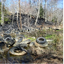 Garner swamp scrap tire pile