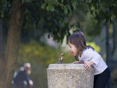 Little girl drinking from fountain