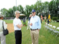 MDE Deputy Secretary Robert Summers (right) with Evan van Hook, Honeywell Vice President of Environmental Projects, at the ceremony for the reopening of Swann Park.